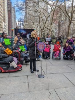 Group of advocates at an Access-A-Ride press conference outside of City Hall subway station.