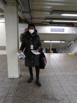CIDNY staff handing out free KN95 masks in the subway.