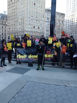 CIDNY's Dr. Sharon McLennon Wier speaks at a rally to shut down Rikers Island in front of a group at Foley Square.