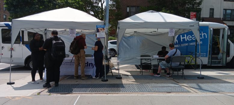 Participants stop by a CIDNY vaccine day mobile clinic for free vaccinations.