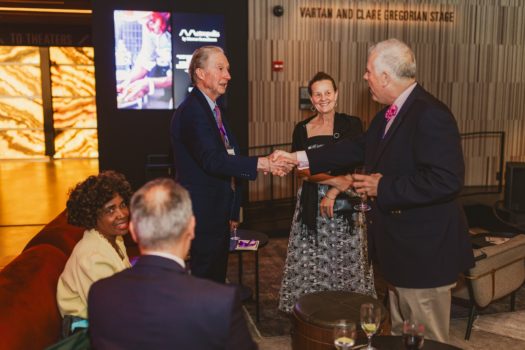 Gala attendees gathered and interacting.