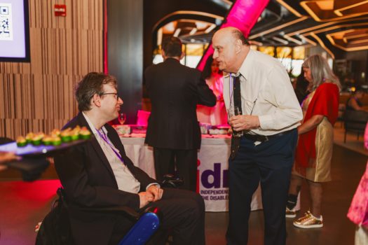 Gala attendees gathered and interacting.