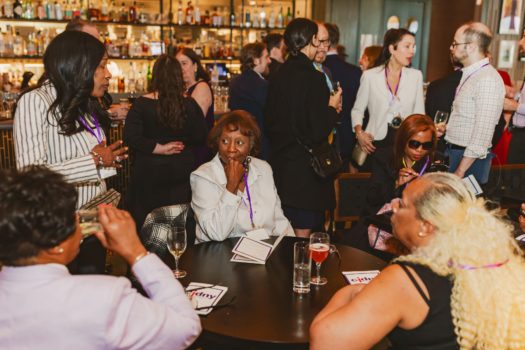 Gala attendees gathered and interacting.