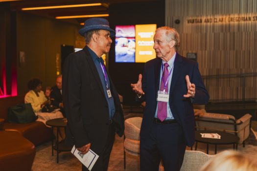 Gala attendees gathered and interacting.