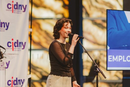 Guest performer singing.