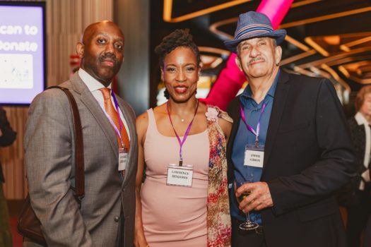 Gala attendees gathered and interacting.