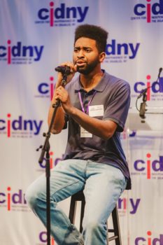 Guest performer singing.