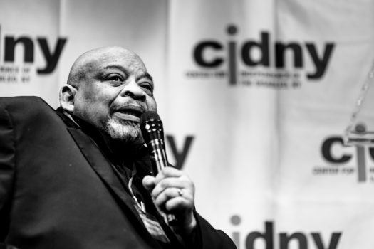 George Gresham from 1199SEIU speaking with mic.