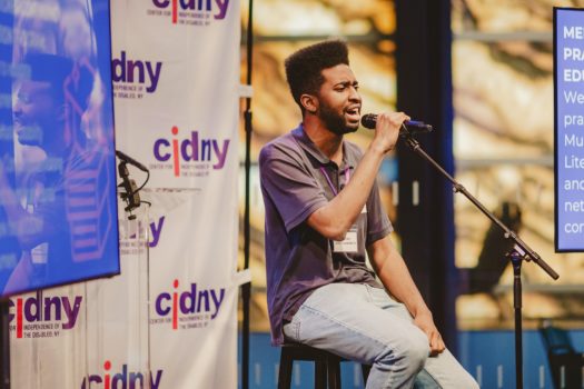 Guest performer singing.