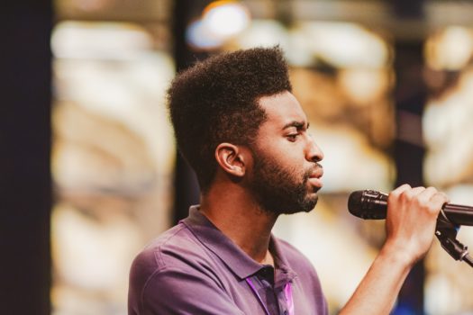 Guest performer singing.