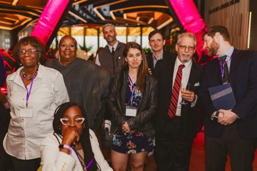 Gala attendees gathered and interacting.