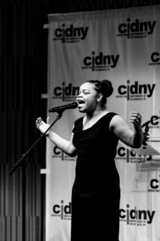 Guest performer singing.