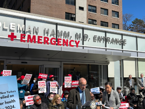 CIDNY General Counsel Arthus Schwartz Esq. speaks at a Medicaid rally at The Brooklyn Hospital surrounded by advocates and Rep. Nydia Velasquez.